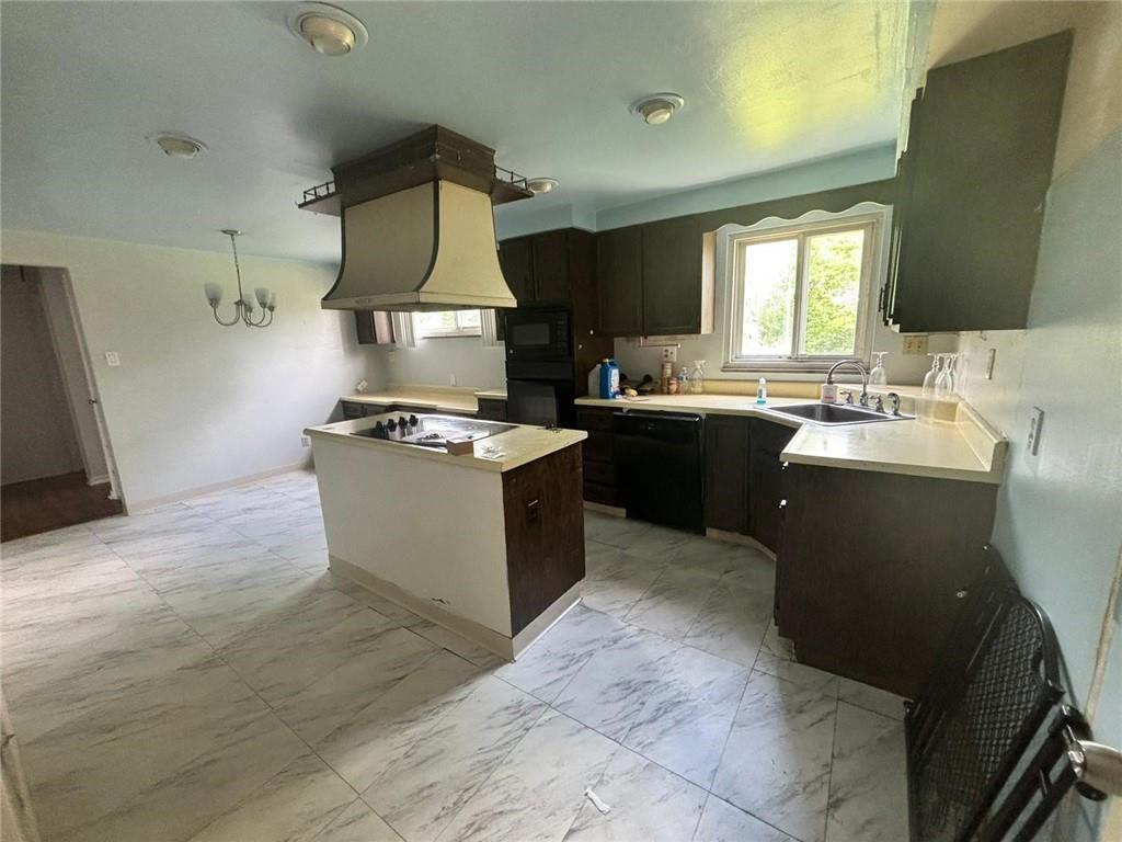 270 Wheeler Avenue McKees Rocks, PA 15136 - Photo 4 of 28 a kitchen with a sink and cabinets