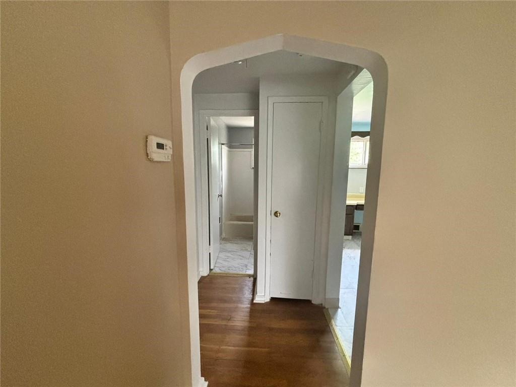270 Wheeler Avenue McKees Rocks, PA 15136 - Photo 5 of 28 a view of a hallway with wooden floor