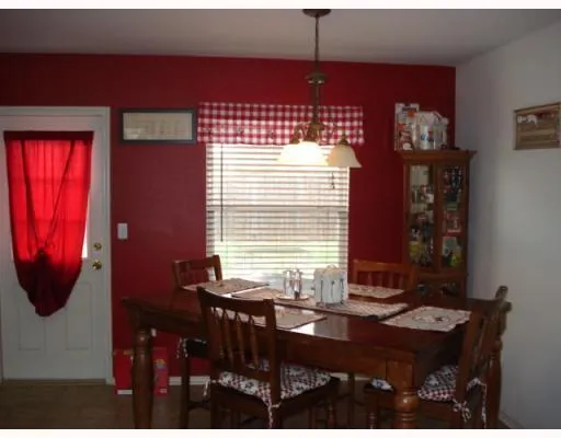 a view of a workspace with furniture