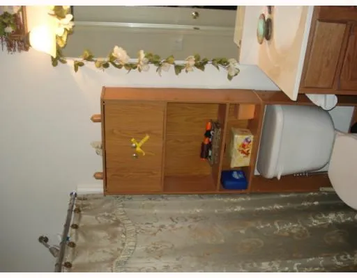 a bedroom with a bed and a fireplace