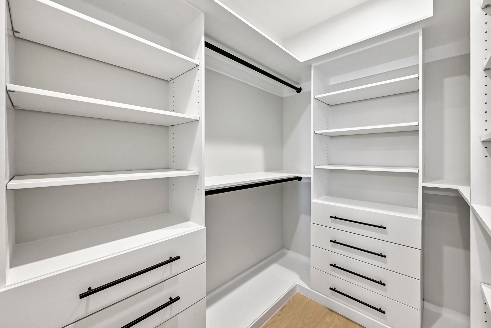 100 West Odell Street, Unit 2 Austin, TX 78752 - Photo 29 of 36 3rd Floor Custom Walk-in Closet in Primary Bathroom.