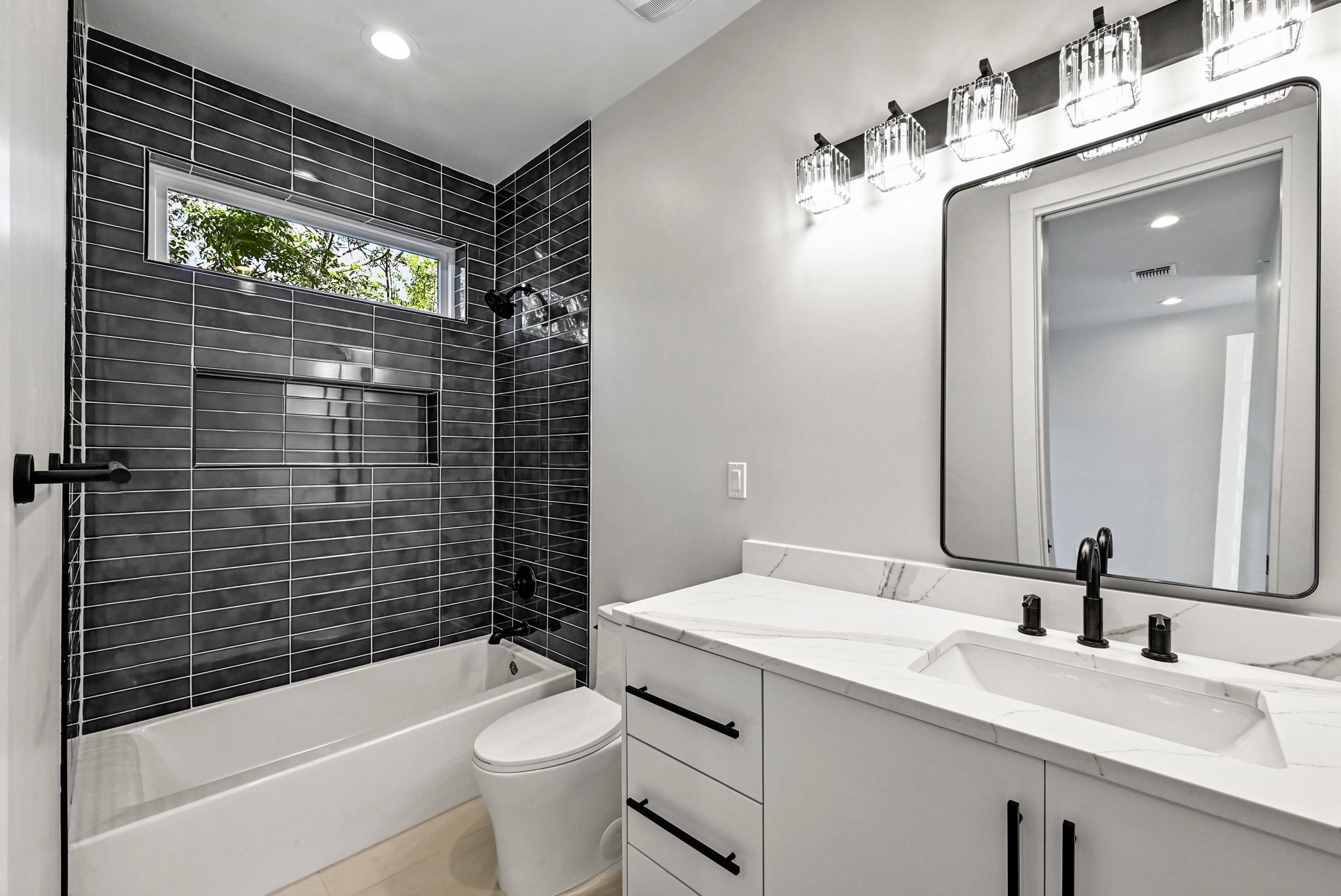 100 West Odell Street, Unit 2 Austin, TX 78752 - Photo 31 of 36 3rd Floor Bathroom with stylish tile and finishes.