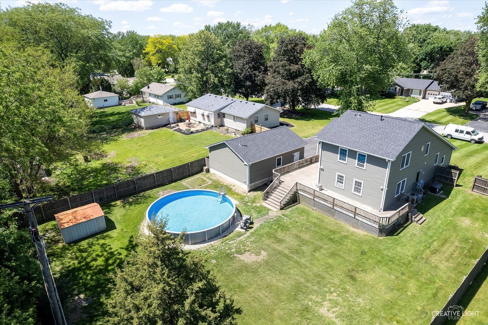 2120 Rockwell Road Aurora, IL 60506 - Photo 36 of 40 an aerial view of a house with swimming pool and big yard