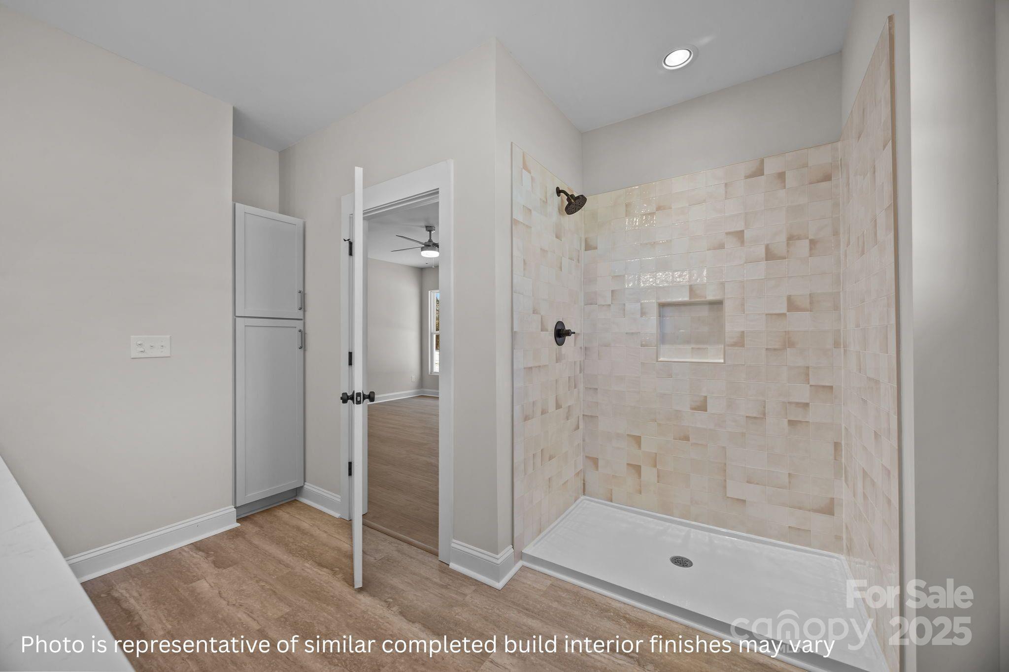 2263 Lee Lawing Road Lincolnton, NC 28092 - Photo 12 of 20 a bathroom with a shower and a sink