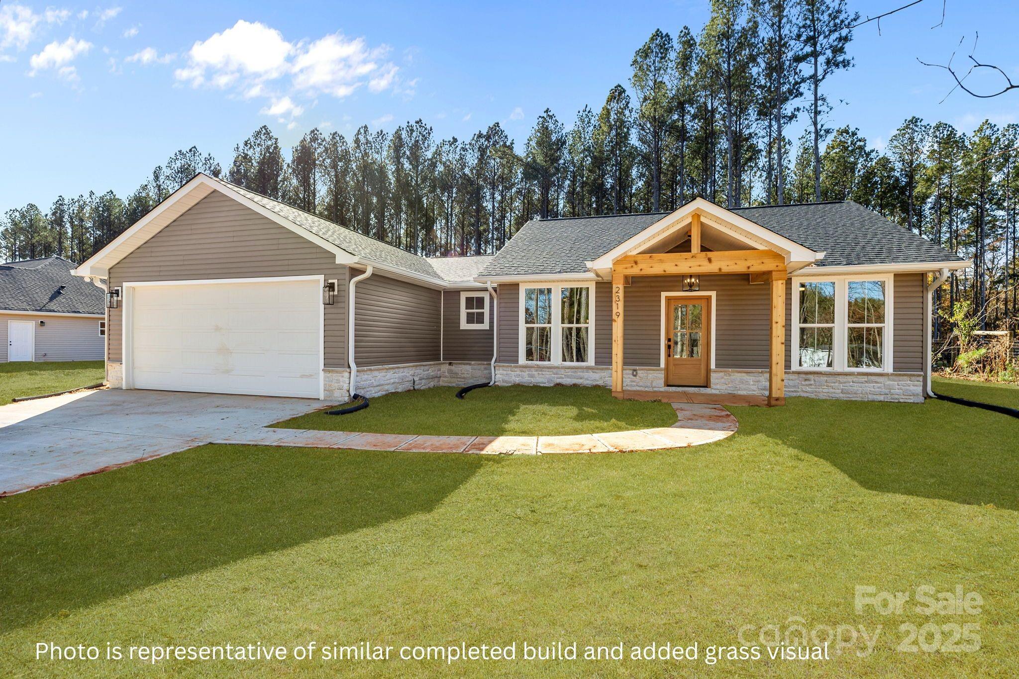 2263 Lee Lawing Road Lincolnton, NC 28092 - Photo 2 of 20 a view of a white house with a swimming pool and porch