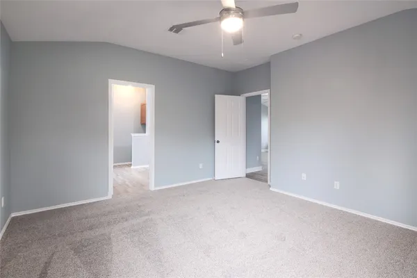 an empty room with a bathroom