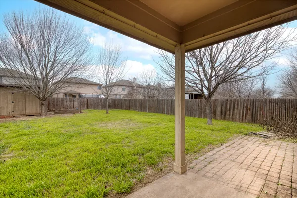 a view of a backyard with a garden