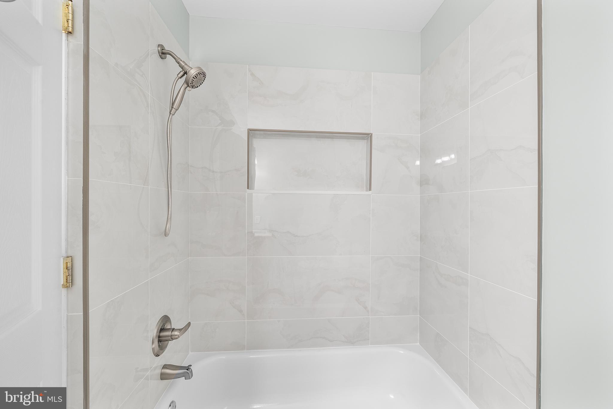 5202 Ridge Avenue Philadelphia, PA 19128 - Photo 14 of 30 a bathroom with a bathtub