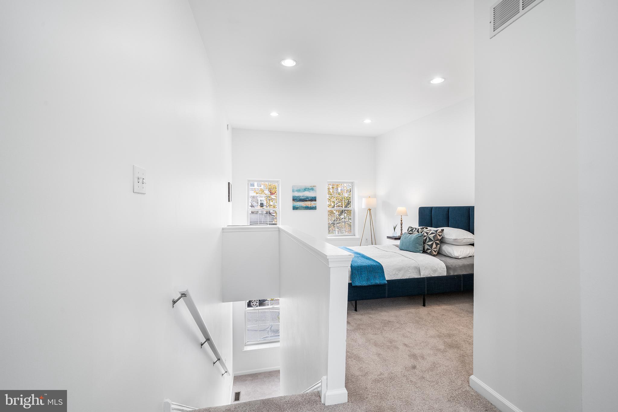 5202 Ridge Avenue Philadelphia, PA 19128 - Photo 18 of 30 a living room with furniture and a table