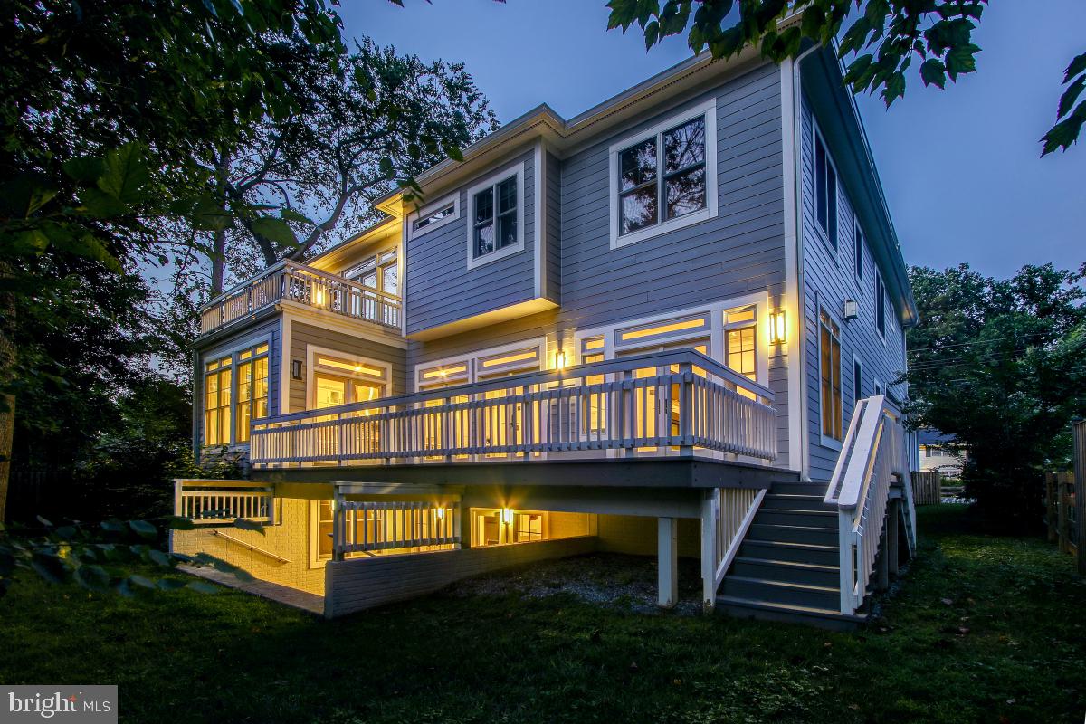 9814 Fernwood Road Bethesda, MD 20817 - Photo 31 of 31 Charming home illuminated at dusk.