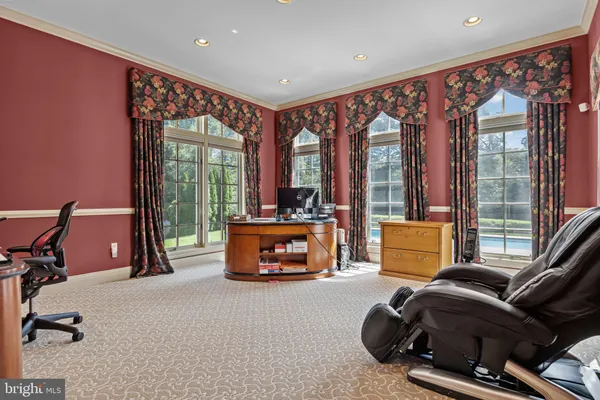 a bedroom with bed and a window