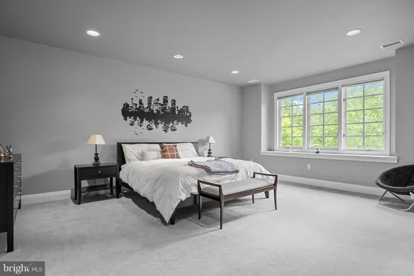 a picture of a room with a white wall and white appliances