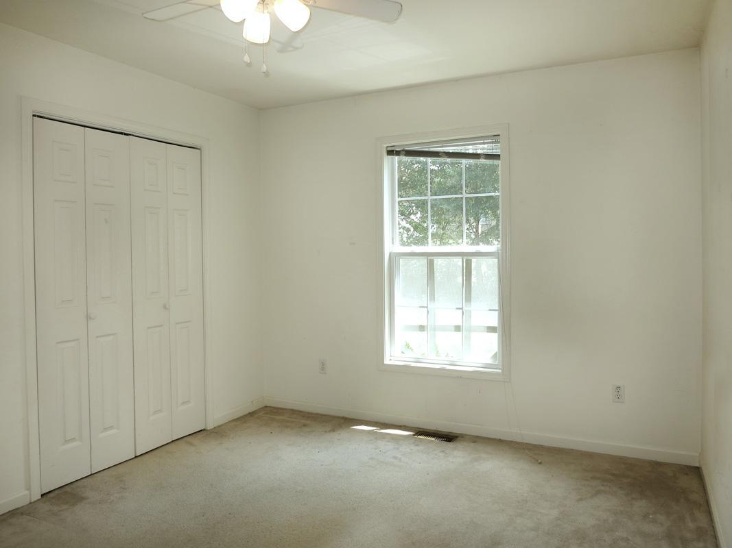 320 Davie Road Carrboro, NC 27510 - Photo 12 of 20 an empty room with a window