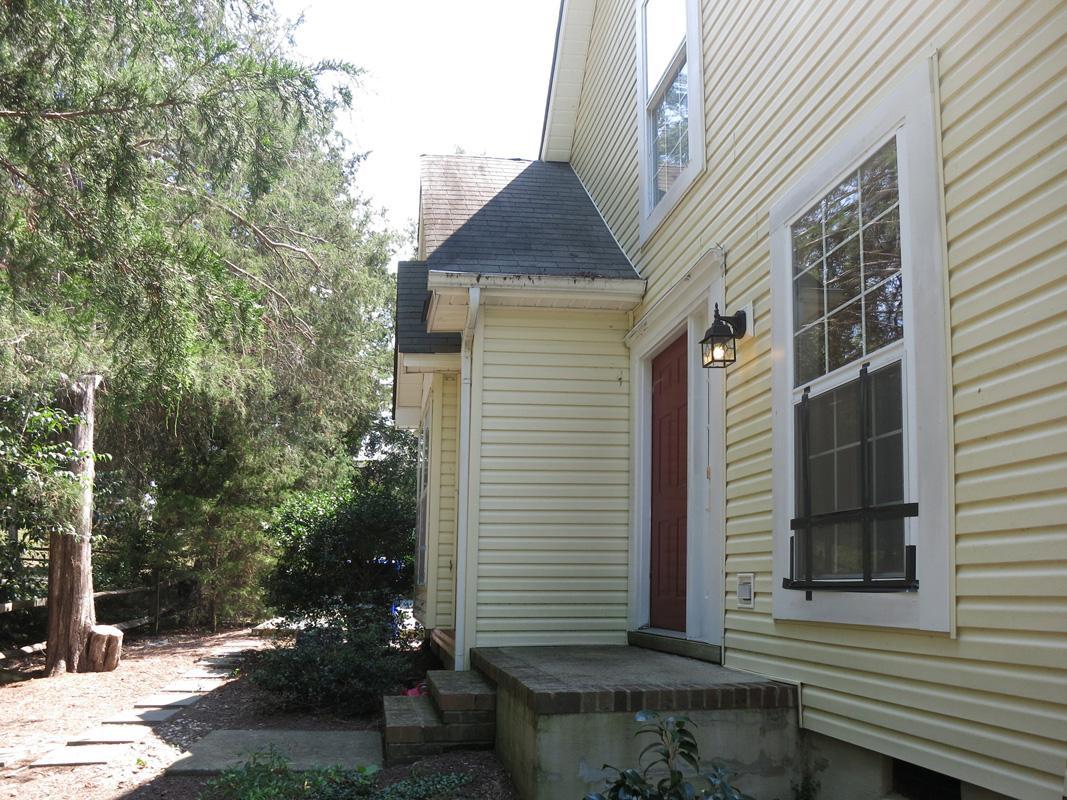 320 Davie Road Carrboro, NC 27510 - Photo 18 of 20 a view of a house with a yard