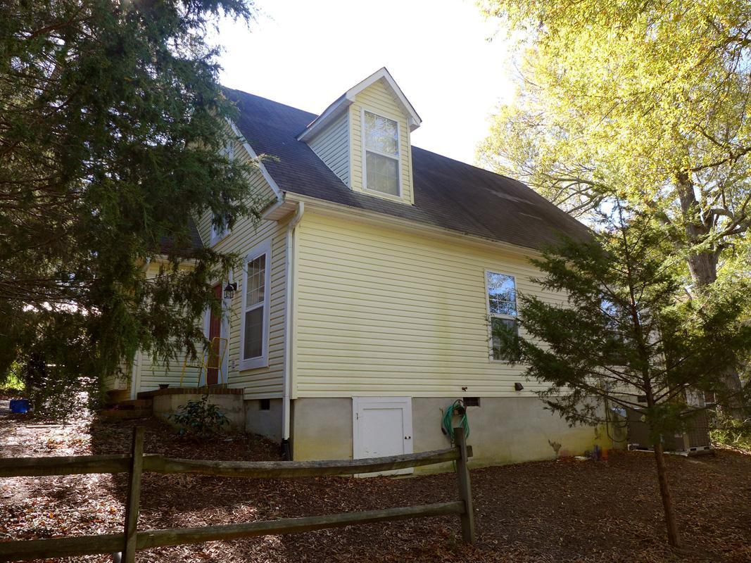 320 Davie Road Carrboro, NC 27510 - Photo 19 of 20 a view of a house with a yard