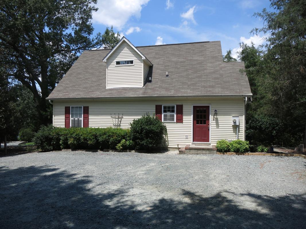 320 Davie Road Carrboro, NC 27510 - Photo 20 of 20 a front view of a house with a yard