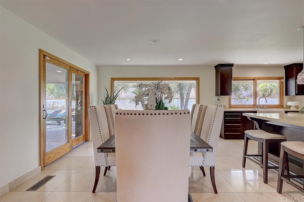 12392 Ranchview Drive Santa Ana, CA 92705 - Photo 11 of 72 a view of a workspace with furniture and a window