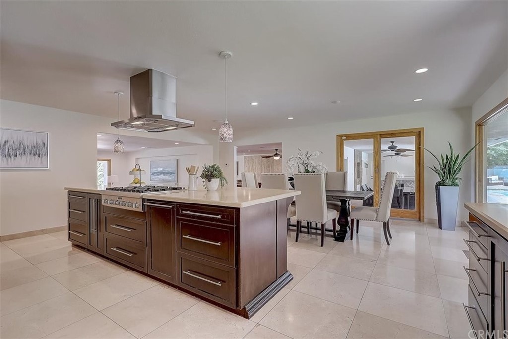 12392 Ranchview Drive Santa Ana, CA 92705 - Photo 18 of 72 a kitchen with stainless steel appliances granite countertop a sink and cabinets