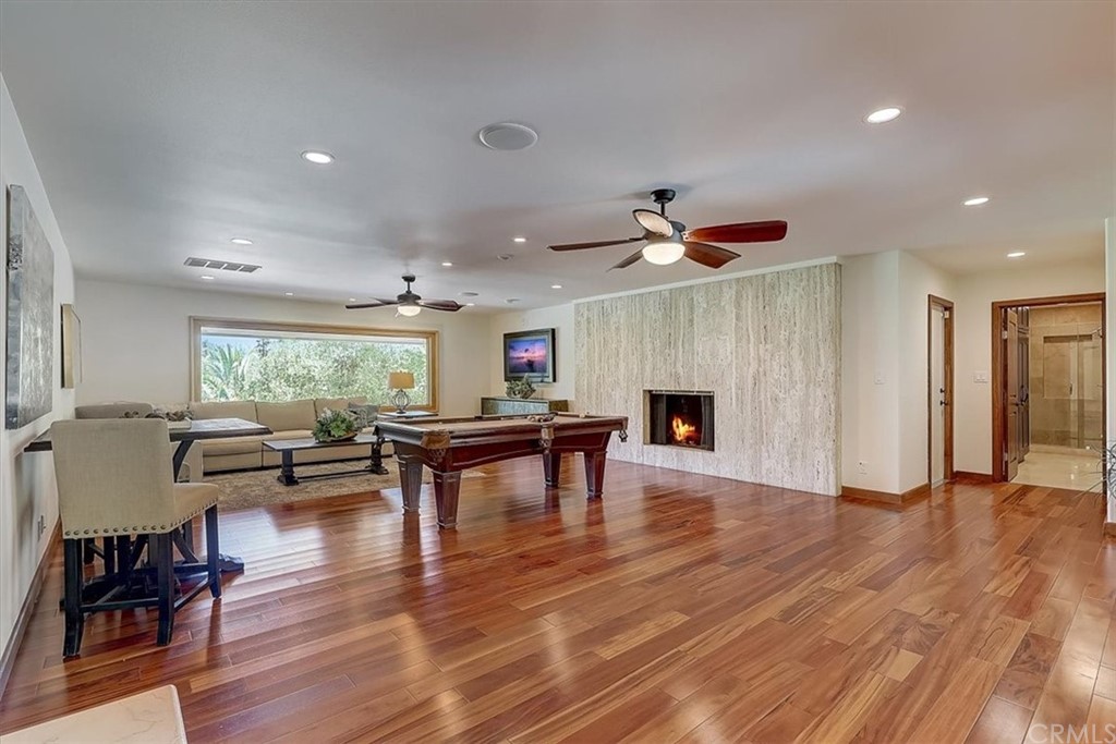 12392 Ranchview Drive Santa Ana, CA 92705 - Photo 21 of 72 a living room with furniture and a fireplace