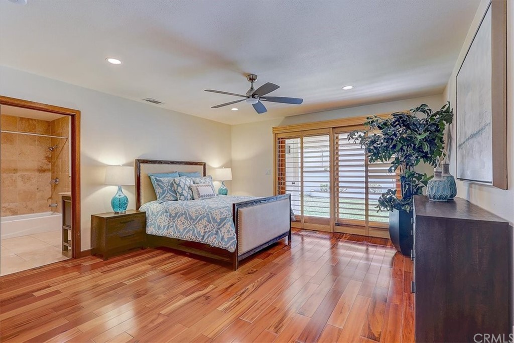 12392 Ranchview Drive Santa Ana, CA 92705 - Photo 30 of 72 a living room with furniture and a large window