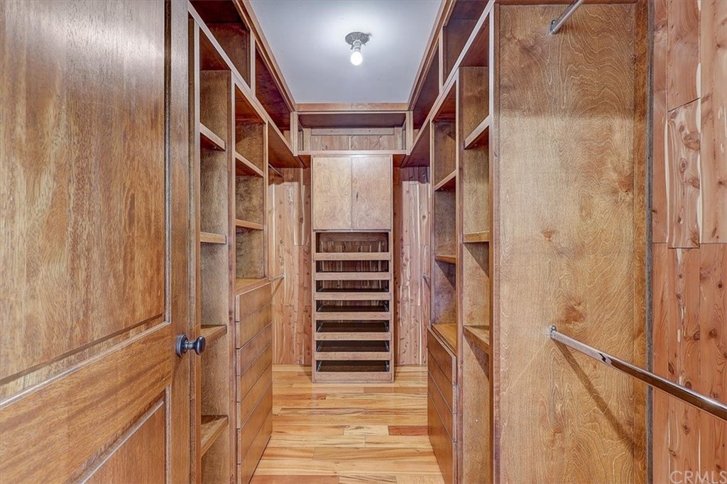 12392 Ranchview Drive Santa Ana, CA 92705 - Photo 37 of 72 a view of a hallway with wooden floor and staircase