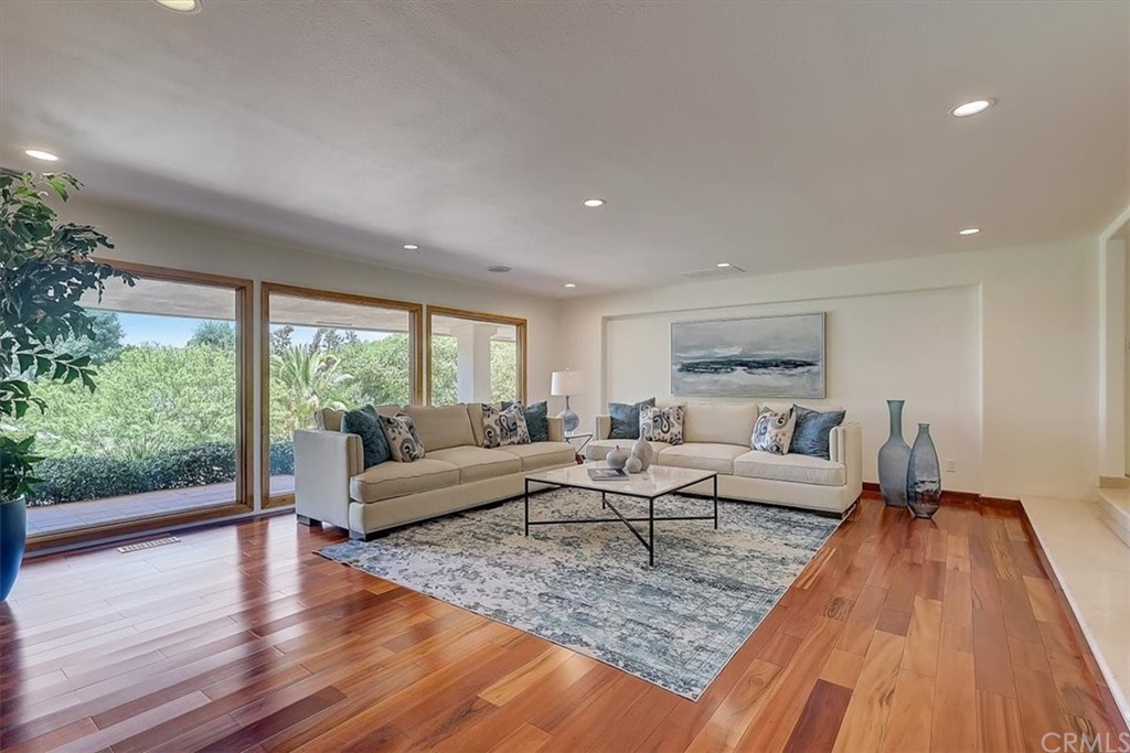 12392 Ranchview Drive Santa Ana, CA 92705 - Photo 4 of 72 a living room with furniture and a wooden floor