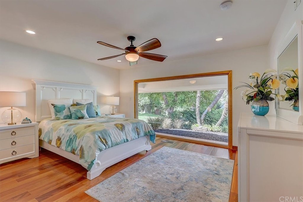 12392 Ranchview Drive Santa Ana, CA 92705 - Photo 43 of 72 a bedroom with a large bed and a window