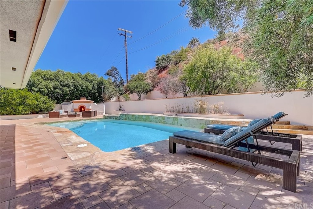 12392 Ranchview Drive Santa Ana, CA 92705 - Photo 58 of 72 a backyard view with a seating space