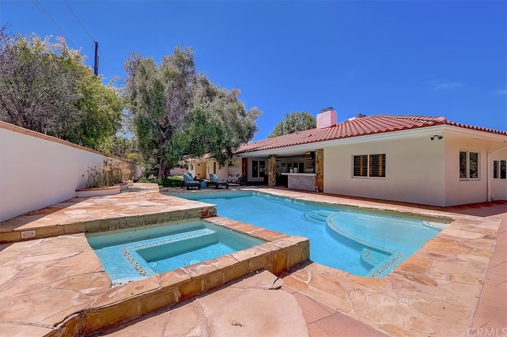 12392 Ranchview Drive Santa Ana, CA 92705 - Photo 62 of 72 a front view of house with yard outdoor seating and covered with trees