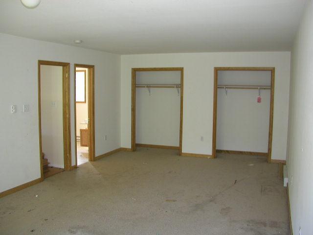 2208 Horatio Road Tobyhanna, PA 18466 - Photo 4 of 8 an empty room with windows and closet