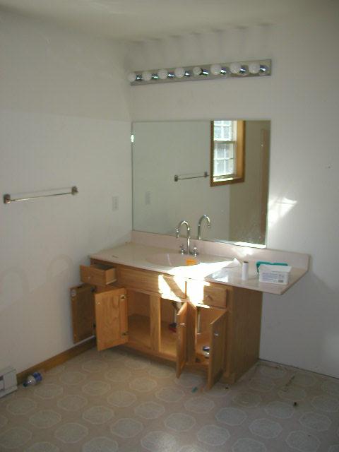 2208 Horatio Road Tobyhanna, PA 18466 - Photo 6 of 8 a bathroom with a sink and a mirror