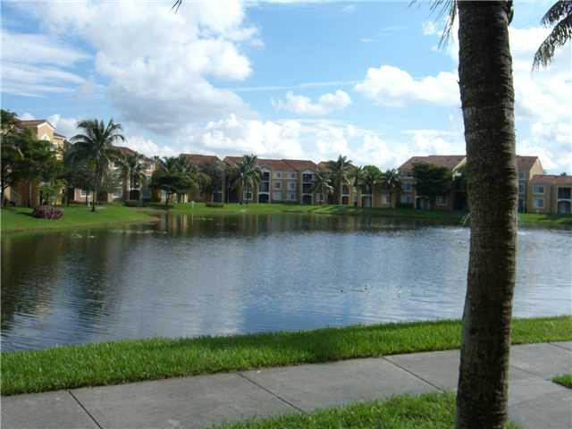 2123 Renaissance Boulevard, Unit 102 Miramar, FL 33025 - Photo 2 of 4 a view of a lake
