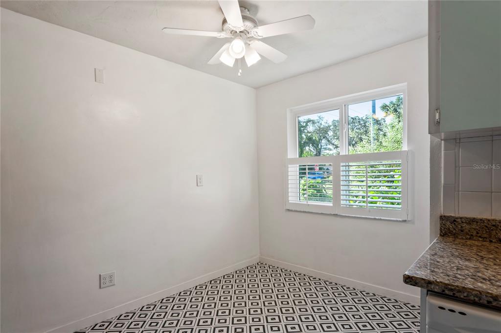 1282 Palm Street Clearwater, FL 33755 - Photo 12 of 55 a view of an empty room with a window