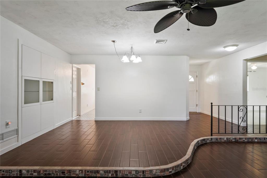 1282 Palm Street Clearwater, FL 33755 - Photo 14 of 55 a view of an empty room with wooden floor
