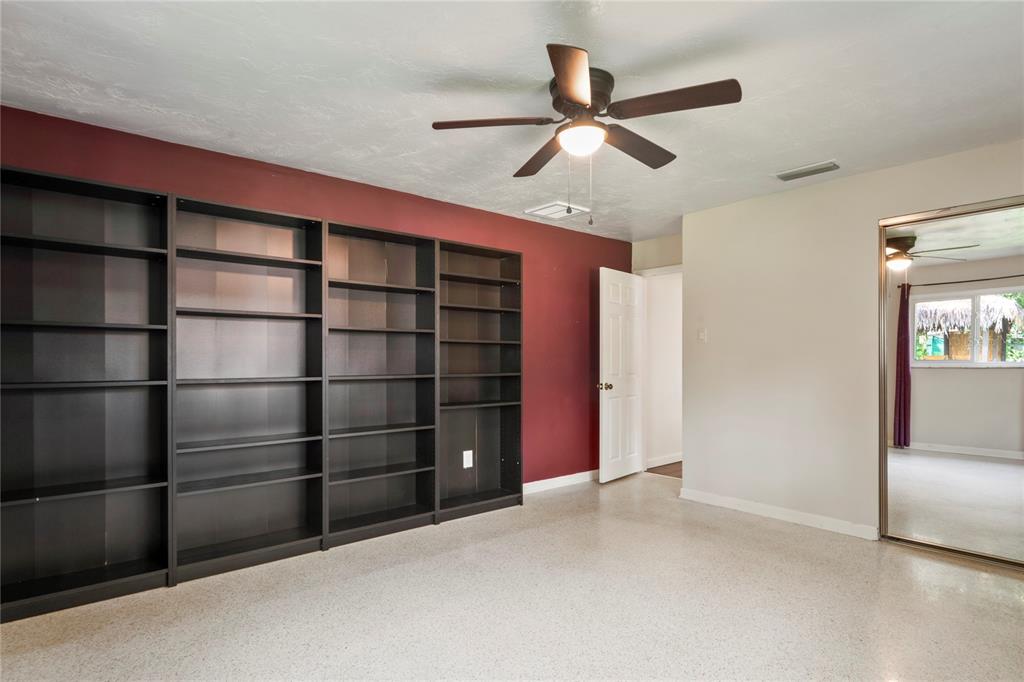 1282 Palm Street Clearwater, FL 33755 - Photo 27 of 55 a view of a livingroom with a ceiling fan