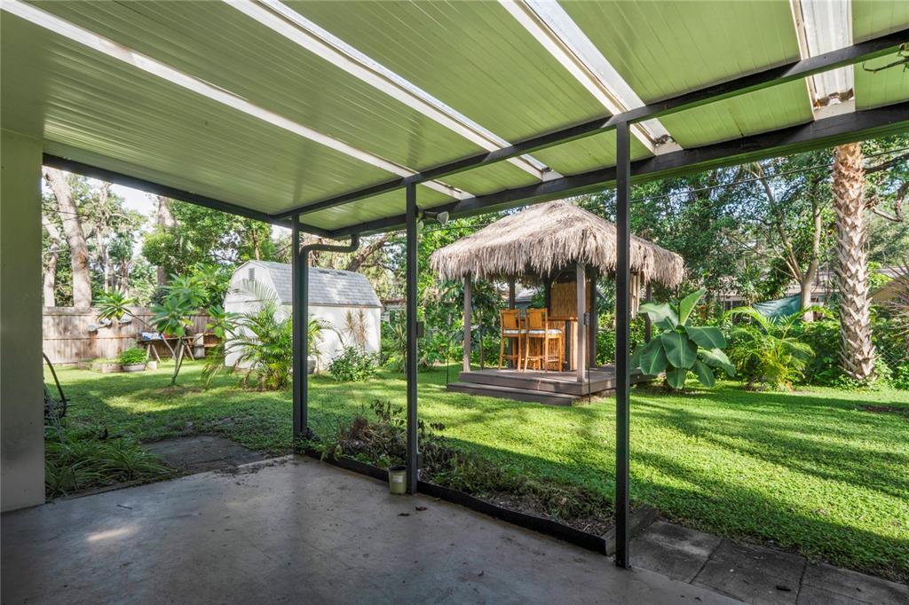 1282 Palm Street Clearwater, FL 33755 - Photo 32 of 55 a view of a backyard with a garden