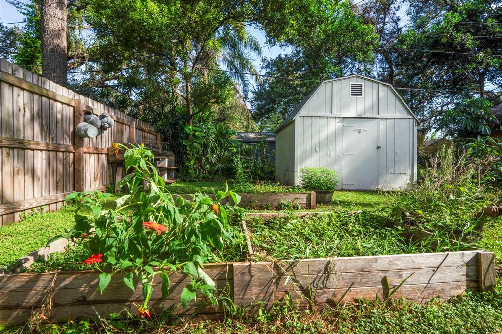 1282 Palm Street Clearwater, FL 33755 - Photo 42 of 55 a backyard of a house with lots of green space