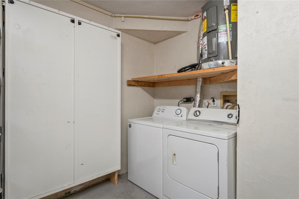 1282 Palm Street Clearwater, FL 33755 - Photo 47 of 55 a utility room with dryer and washer
