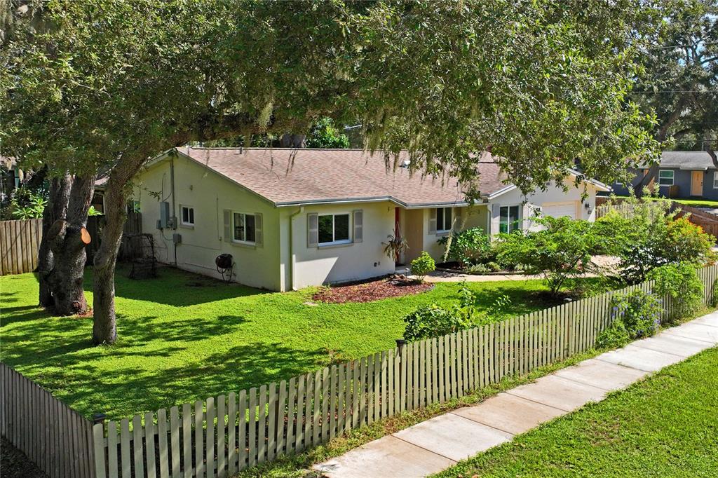 1282 Palm Street Clearwater, FL 33755 - Photo 48 of 55 a front view of a house with yard and green space