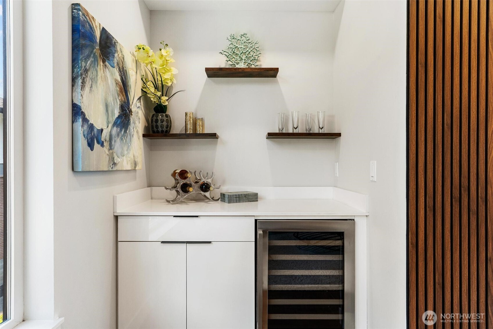7146 47th Avenue Southwest Seattle, WA 98136 - Photo 13 of 34 a sink with a cabinets and potted plant on it