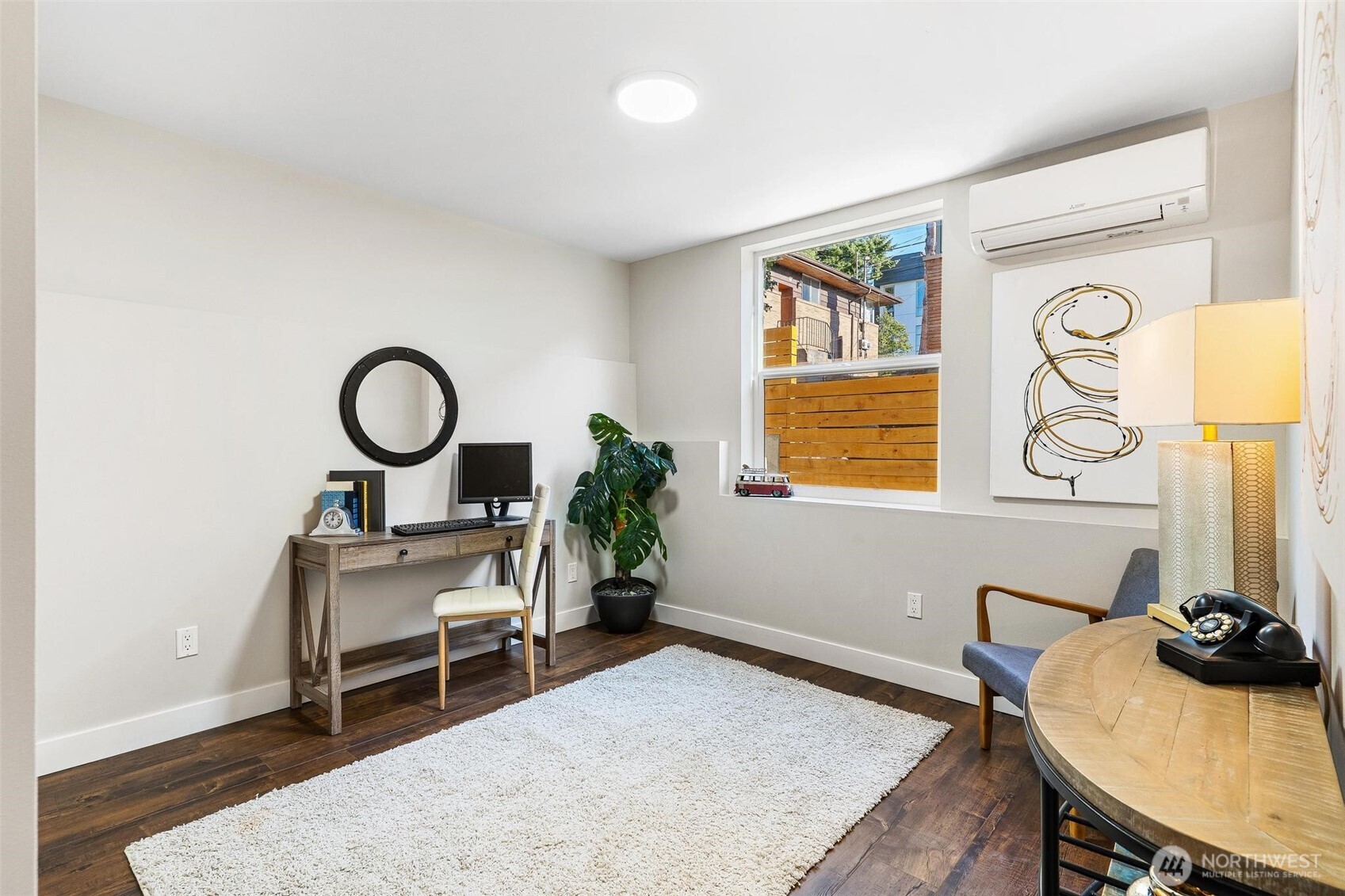 7146 47th Avenue Southwest Seattle, WA 98136 - Photo 20 of 34 a view of a workspace room with furniture and window