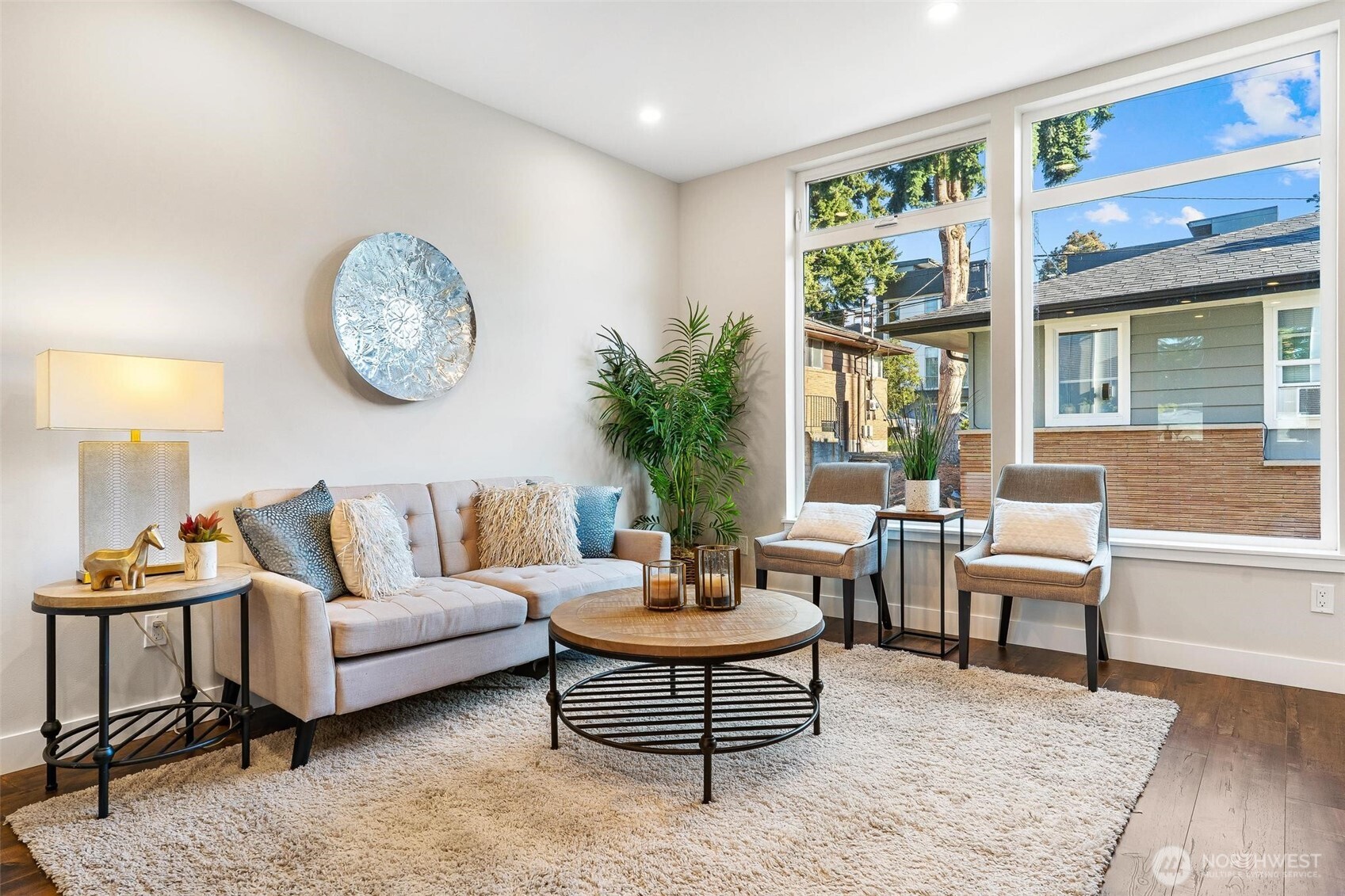 7146 47th Avenue Southwest Seattle, WA 98136 - Photo 2 of 34 a living room with furniture lamp and window