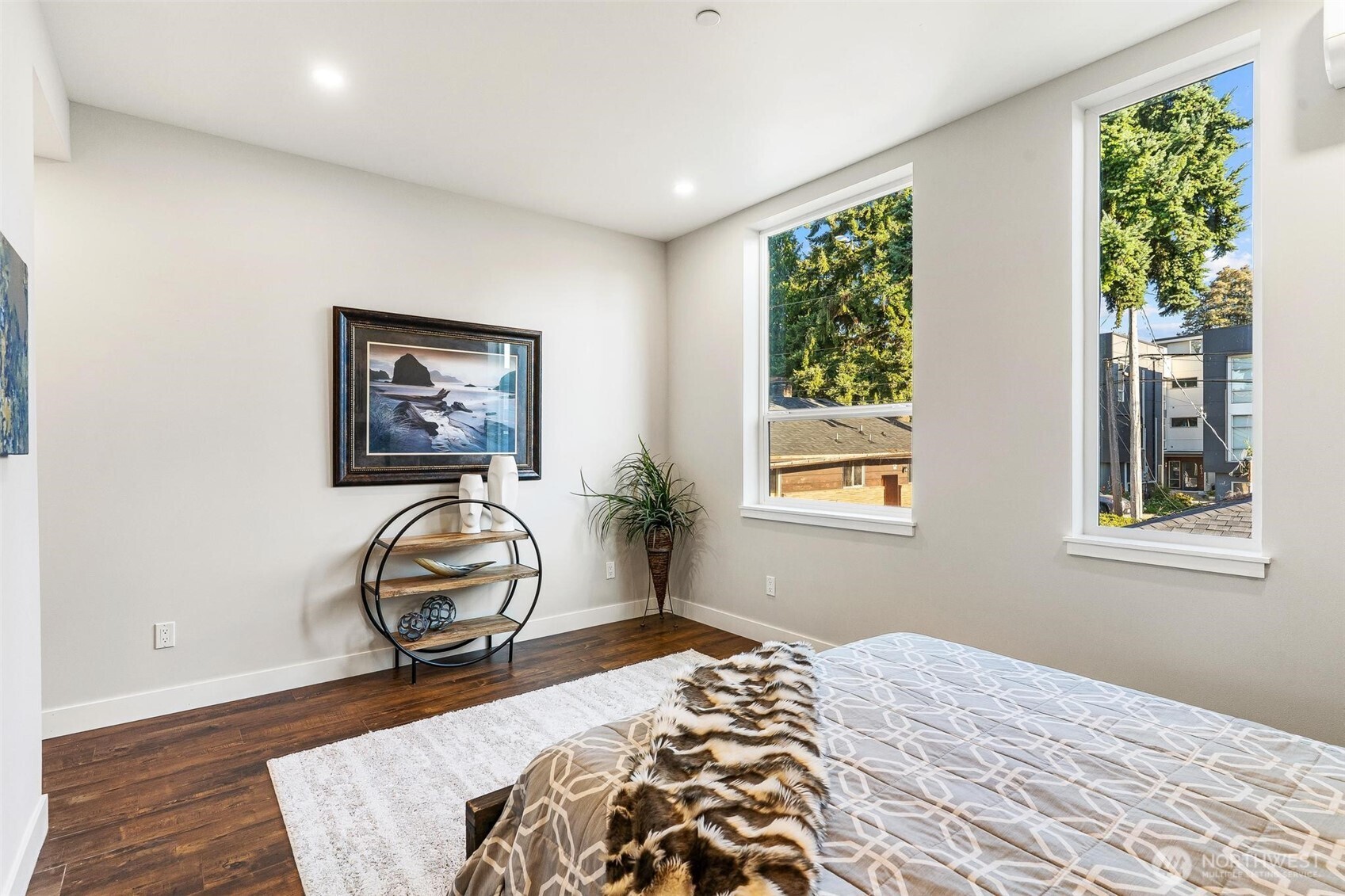 7146 47th Avenue Southwest Seattle, WA 98136 - Photo 24 of 34 a bedroom with furniture and a window