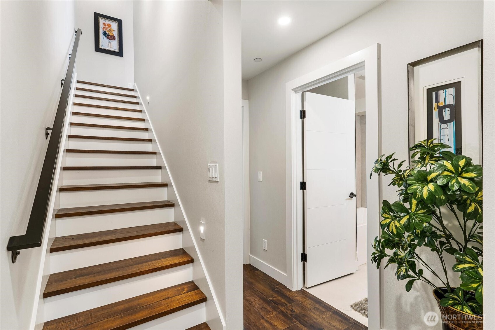 7146 47th Avenue Southwest Seattle, WA 98136 - Photo 25 of 34 a view of a hallway with wooden floor and entryway