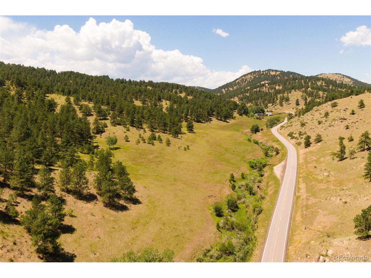 3 Legacy Ranch Evergreen, CO 80439 - Photo 17 of 17 The turn off on Kerr Gulch (right side of the picture) will be where the private road will be built.