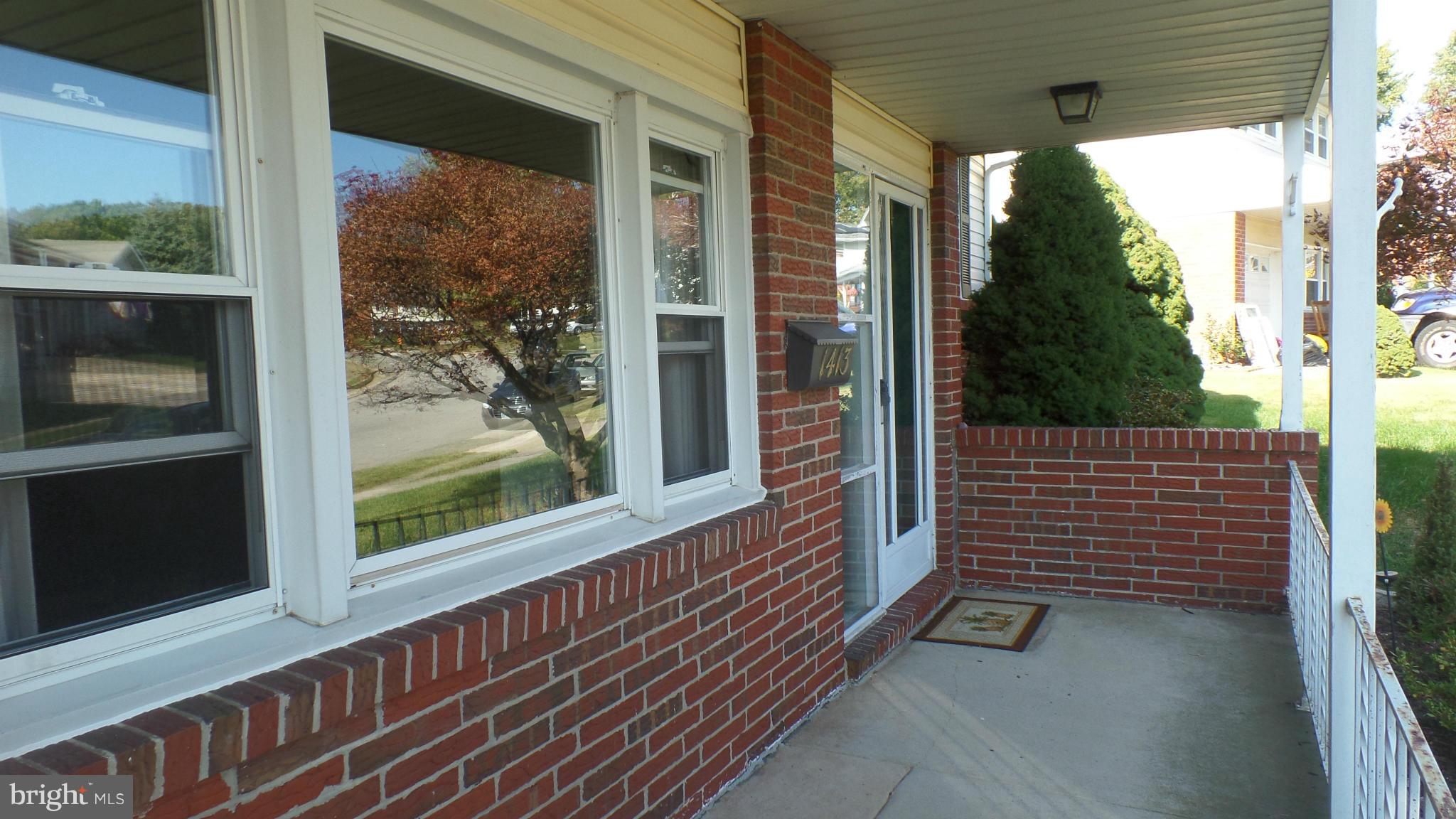 1413 Mt Airy Road Baltimore, MD 21237 - Photo 3 of 28 a view of a door and a window