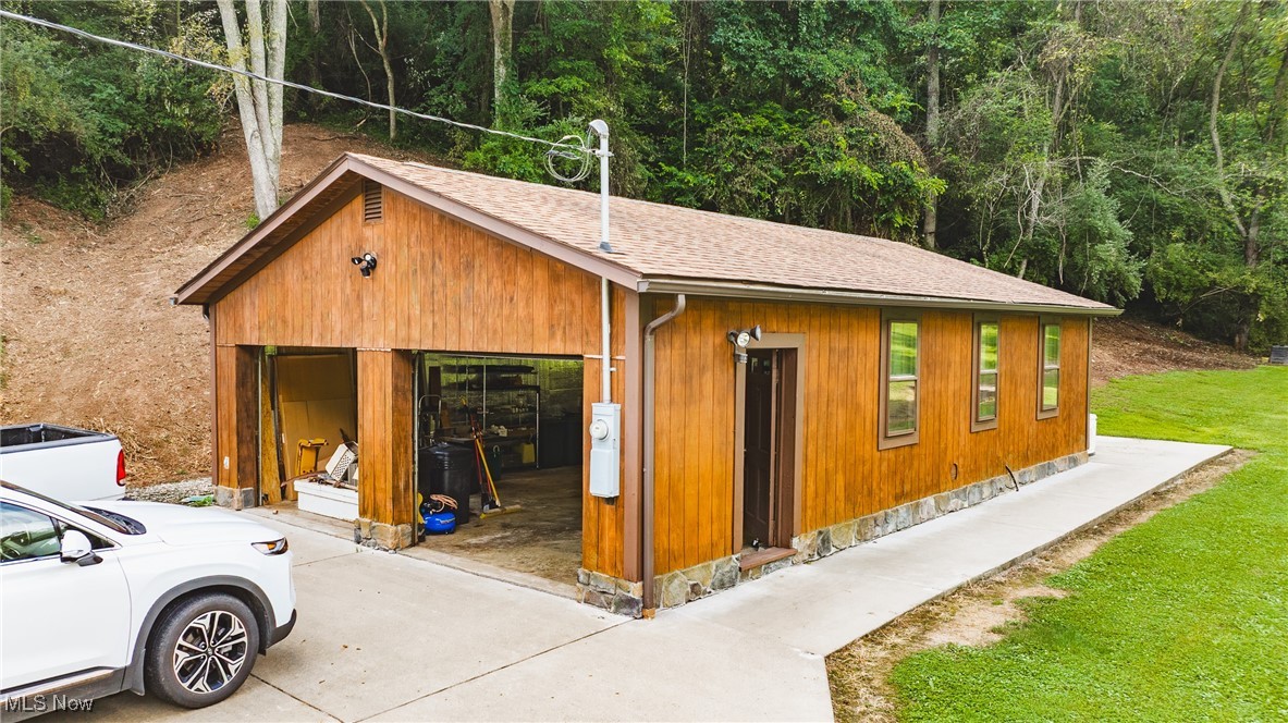 8089 Elk Fork Road Middlebourne, WV 26149 - Photo 38 of 50 Primary Garage Heated/AC Insulated Whole Building Generator, Wood Shop