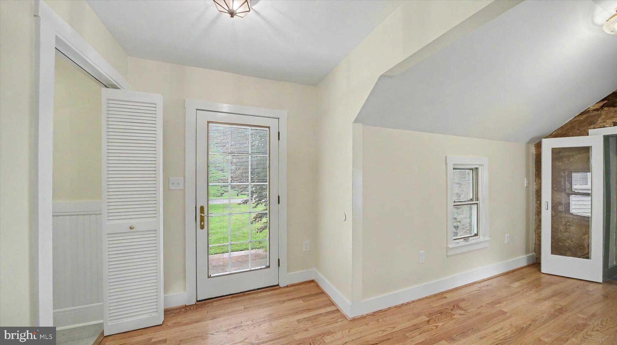 4037 Grande View Drive Pylesville, MD 21132 - Photo 11 of 74 a view of an empty room with window and wooden floor