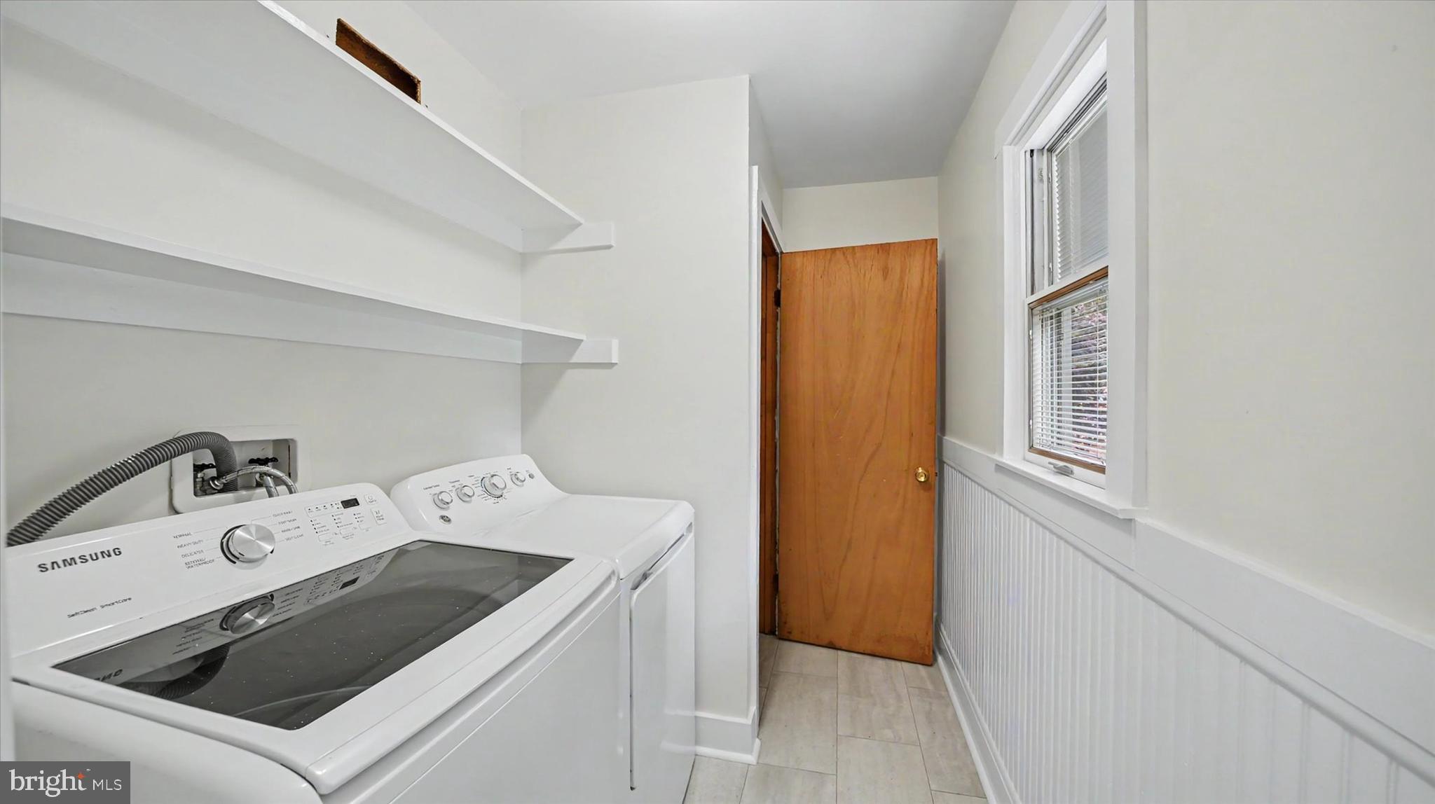 4037 Grande View Drive Pylesville, MD 21132 - Photo 12 of 74 a utility room with dryer and washer