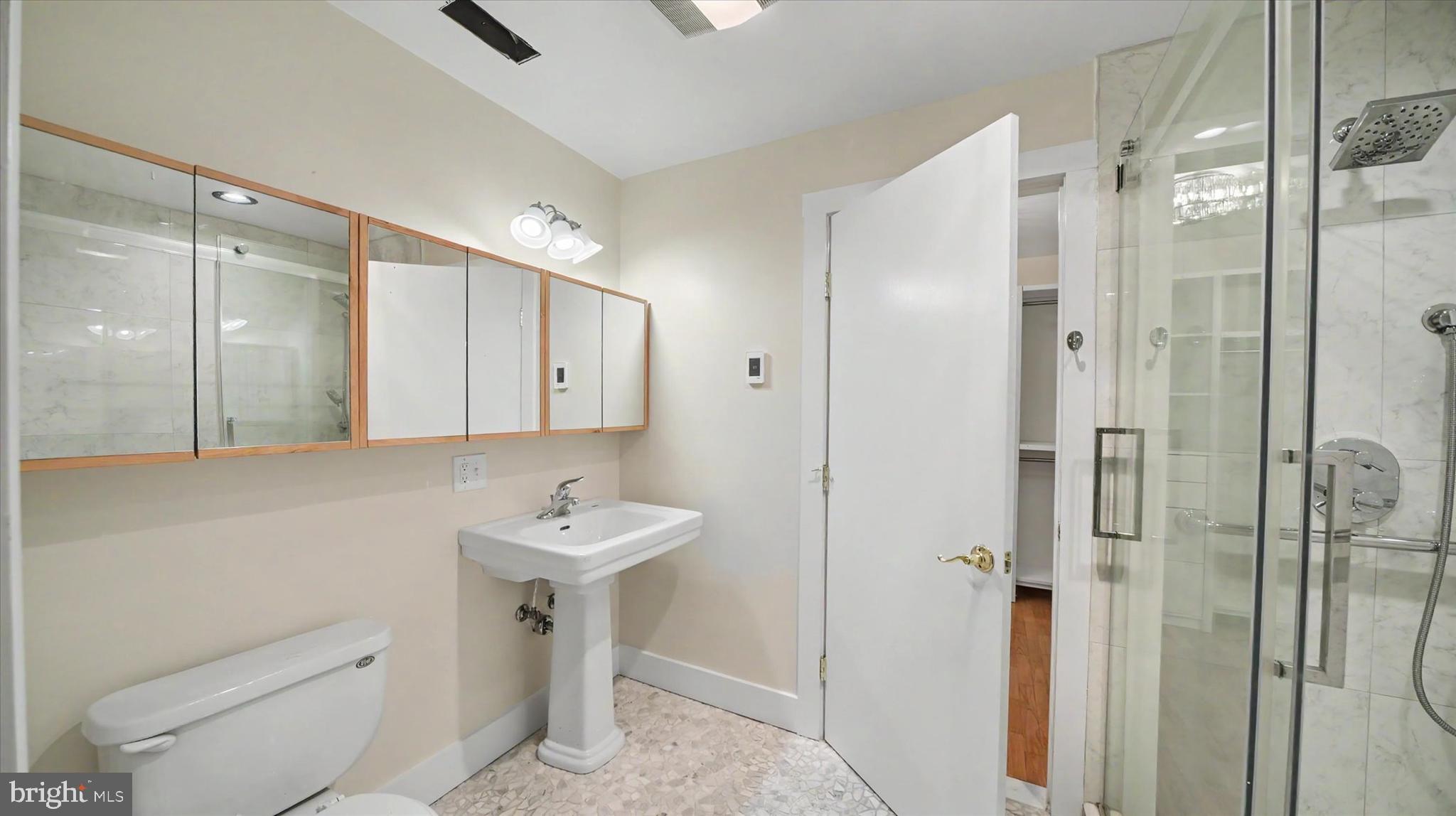 4037 Grande View Drive Pylesville, MD 21132 - Photo 29 of 74 a bathroom with a sink toilet and shower